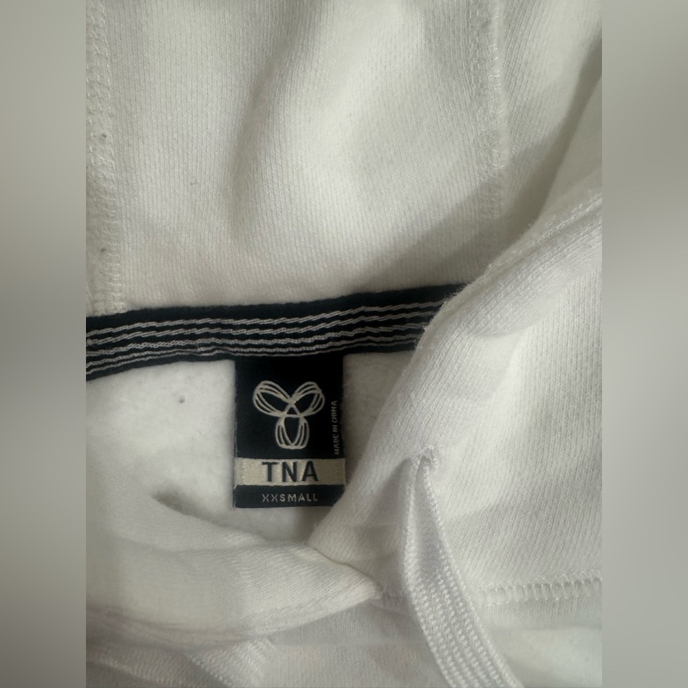 TNA Cream Hoodie Sweater with Black Design - Picture 2 of 9